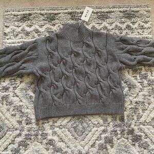 Cable knit sweater